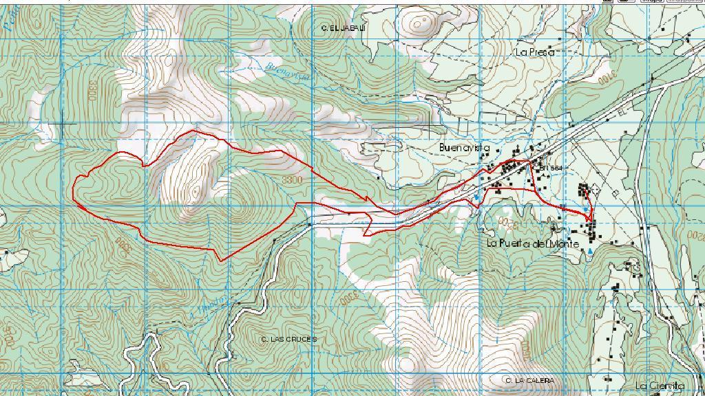 A topographic map displaying contour lines and elevation levels, with a red route traced throughout the terrain. Key locations such as Buenavista, La Puerta del Monte, and La Pissa are labeled, indicating various geographical features in the area. The grid overlay helps to identify coordinates and orientation. Clasic Map mountain bike trail.
