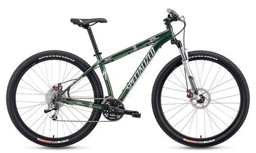 Specialized Rockhopper Comp 29: A green mountain bike with a lightweight frame, front suspension, and disc brakes, featuring wide tires and a 21-speed gear system.