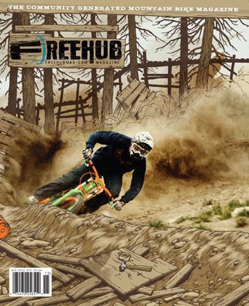 Freehub Mountain Bike Journal: A mountain biker skillfully maneuvering through a dusty trail, surrounded by trees, featured on the cover of Freehub Magazine, which highlights community-generated content related to mountain biking. The title is prominently displayed at the top of the cover.