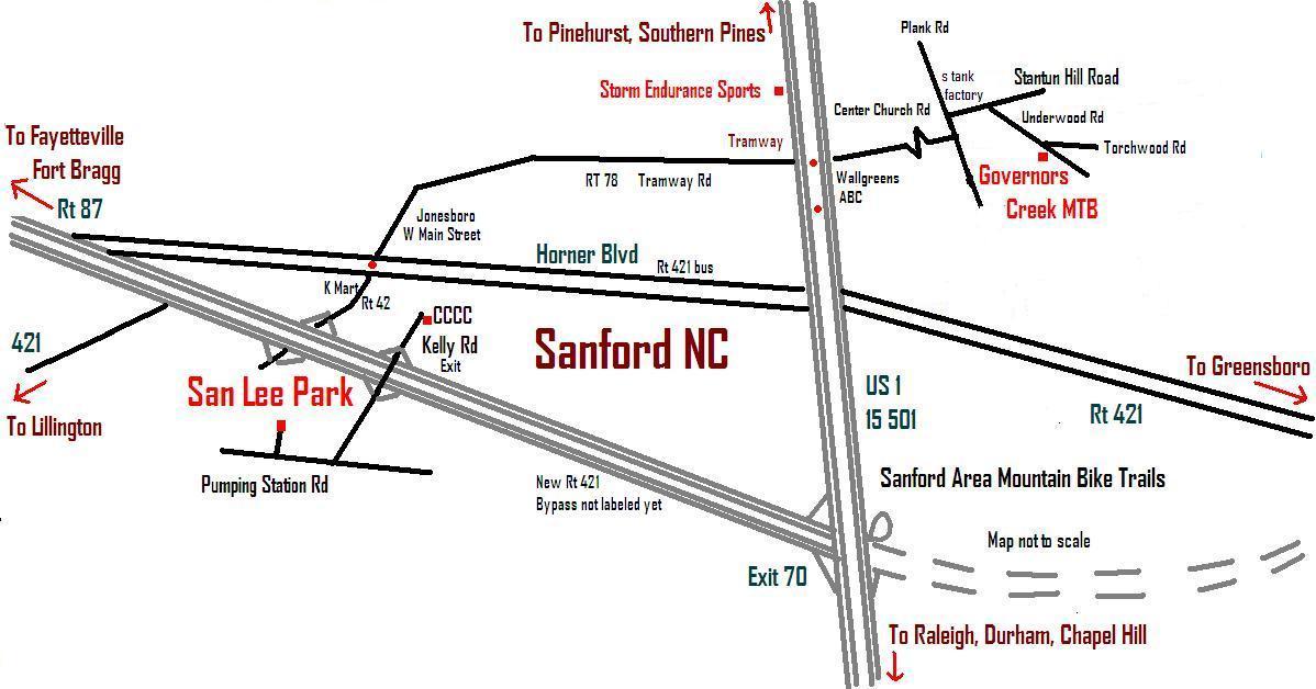A labeled map of Sanford, North Carolina, depicting important routes and landmarks. Key locations include San Lee Park, several highways (US 1, Route 421, Route 87), and nearby areas such as Fayetteville, Fort Bragg, and locations for mountain bike trails. The map also shows exit information and nearby roads. Not to scale. San-lee Park mountain bike trail.
