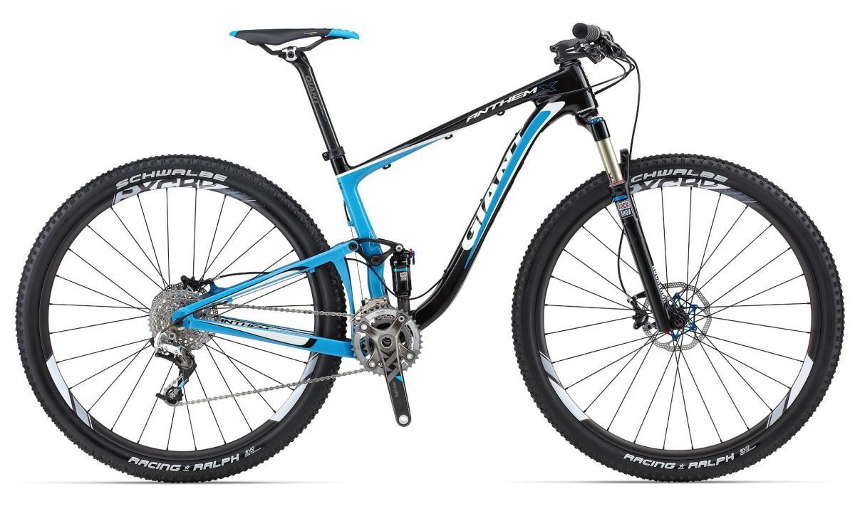 Giant Anthem X 29er 1: A blue and black mountain bike with a sleek design, featuring large tires and front suspension. The bike has a visible gear system and disc brakes, making it suitable for off-road adventures. The frame is lightweight, highlighted by the brand name "Giant" on the side.