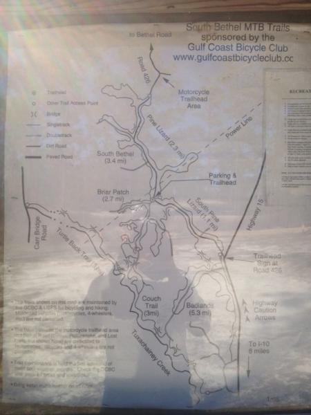 Map of the South Bethel MTB Trails sponsored by the Gulf Coast Bicycle Club. The map outlines various trails, including South Bethel (3.4 miles), Briar Patch (2.7 miles), Couch Trail (3 miles), and Badlands (5.3 miles), along with access points and parking information. Additional details include trail types and a legend for navigation. Bethel Bike Trails mountain bike trail.
