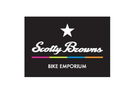 Logo for Scotty Browns Bike Emporium featuring a star, with the text "Scotty Browns" in a stylized font above the words "BIKE EMPORIUM," all set against a black background with colorful horizontal lines.