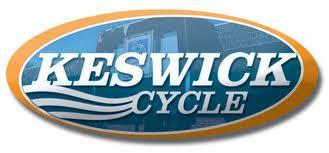 Logo of Keswick Cycle, featuring the text "KESWICK" in bold white letters above "CYCLE," all set against a blue background with an orange oval border.