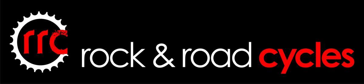 Logo for "rock & road cycles," featuring a stylized gear icon and the brand name in bold typography against a black background.