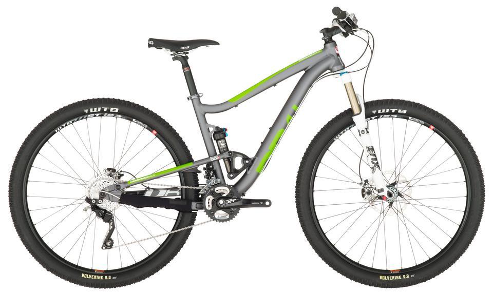 Diamondback Sortie 3 29er: A modern mountain bike with a sleek gray frame and vibrant green accents. It features large, rugged tires, a front suspension fork, and high-performance gearing, making it suitable for off-road trails and rough terrain. The bike is positioned to show both sides clearly, emphasizing its design and components.