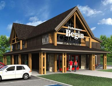 Modern building with a wooden facade and steeply angled roof, featuring large windows and a sign that reads "Performance Begin." Two people are entering the building, and several parked cars are visible in front. The setting includes green grass and a blue sky with clouds.