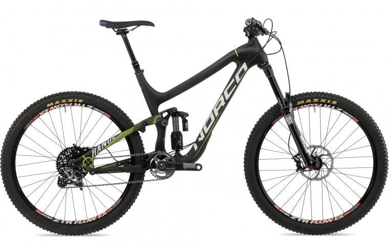 Norco Range Carbon: A sleek, modern mountain bike with a black and green frame, featuring large tires with red accents, front suspension, and a gear system, positioned against a plain background.