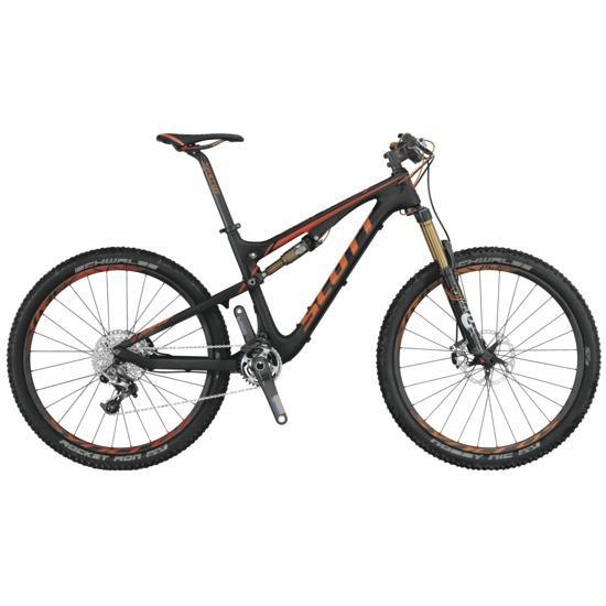 Scott Genius LT 700: A high-performance mountain bike featuring a black and orange design, with a lightweight carbon frame, multiple gears, and rugged tires suitable for off-road terrain.