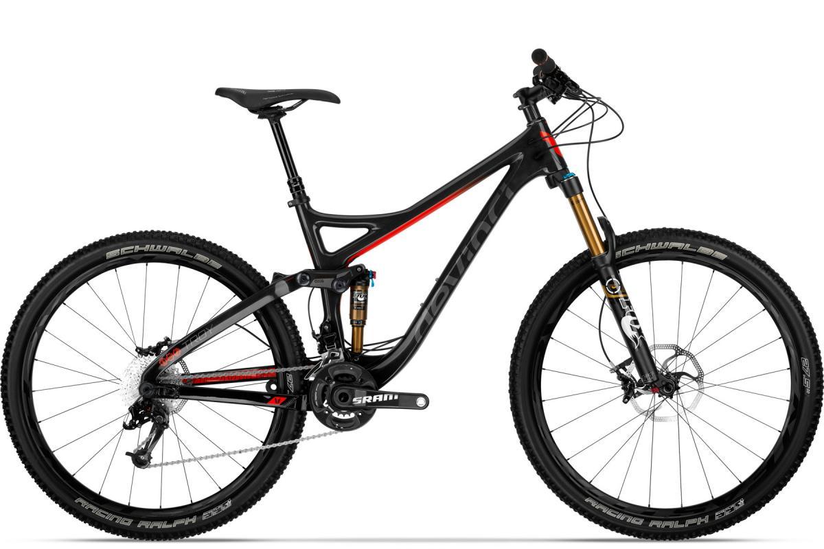 Devinci Troy Carbon RR: A modern mountain bike featuring a sleek black and red frame, high-performance suspension, and rugged tires. The bike is equipped with a SRAM drivetrain and disc brakes, designed for off-road trails and rugged terrain.