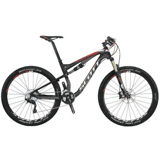 Scott Spark 710: A black and red mountain bike with a lightweight frame, front suspension, and knobby tires, showcasing disc brakes and multiple gears.