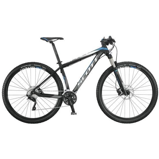 Scott Scale 960: Mountain bike with a black and blue frame, featuring wide tires, disc brakes, and a lightweight design, suitable for off-road cycling.