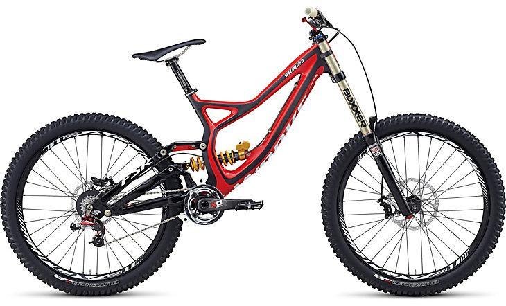 Specialized S-Works Demo 8: A sleek, high-performance downhill mountain bike featuring a red and black frame, wide tires for grip, and advanced suspension components designed for rugged terrain.