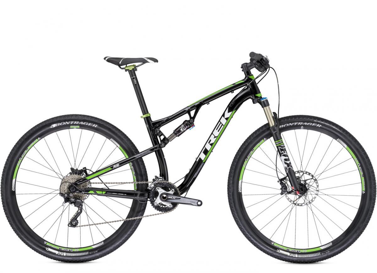 Trek Superfly FS 8: Alt text: A black and green mountain bike, featuring a lightweight frame, front suspension, and rugged tires. The bike components include Bontrager wheels and Shimano XT gearing, showcasing a design suitable for off-road cycling.