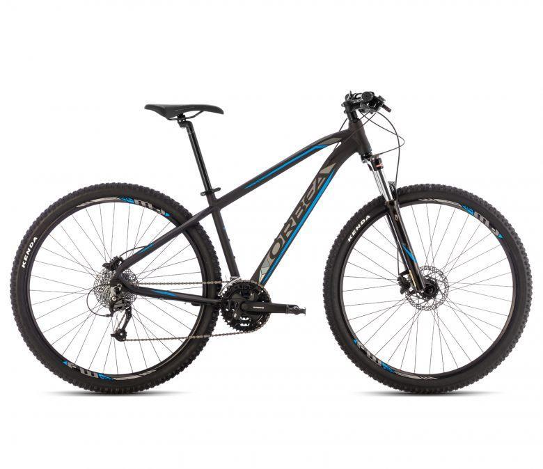 Orbea MX 29 20: Alt text: A black mountain bike with blue accents, featuring thick tires, a lightweight frame, and a front suspension fork, positioned on a white background.