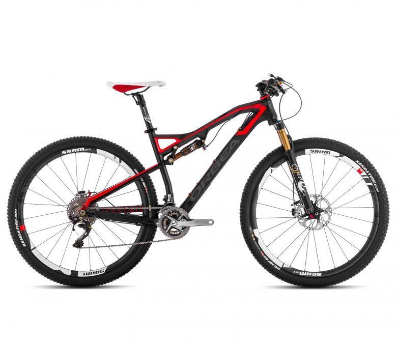 Orbea Occam 29 M10: Mountain bike featuring a lightweight carbon frame in black and red, equipped with front and rear suspension, disc brakes, and high-performance components suitable for off-road cycling.
