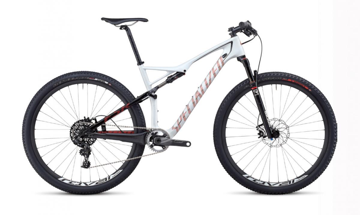 Specialized Epic Expert Carbon World Cup: A modern mountain bike with a sleek design, featuring a lightweight frame, disc brakes, and wide tires for improved traction. The bike is displayed against a plain white background, highlighting its detailed components such as the drivetrain and suspension system.