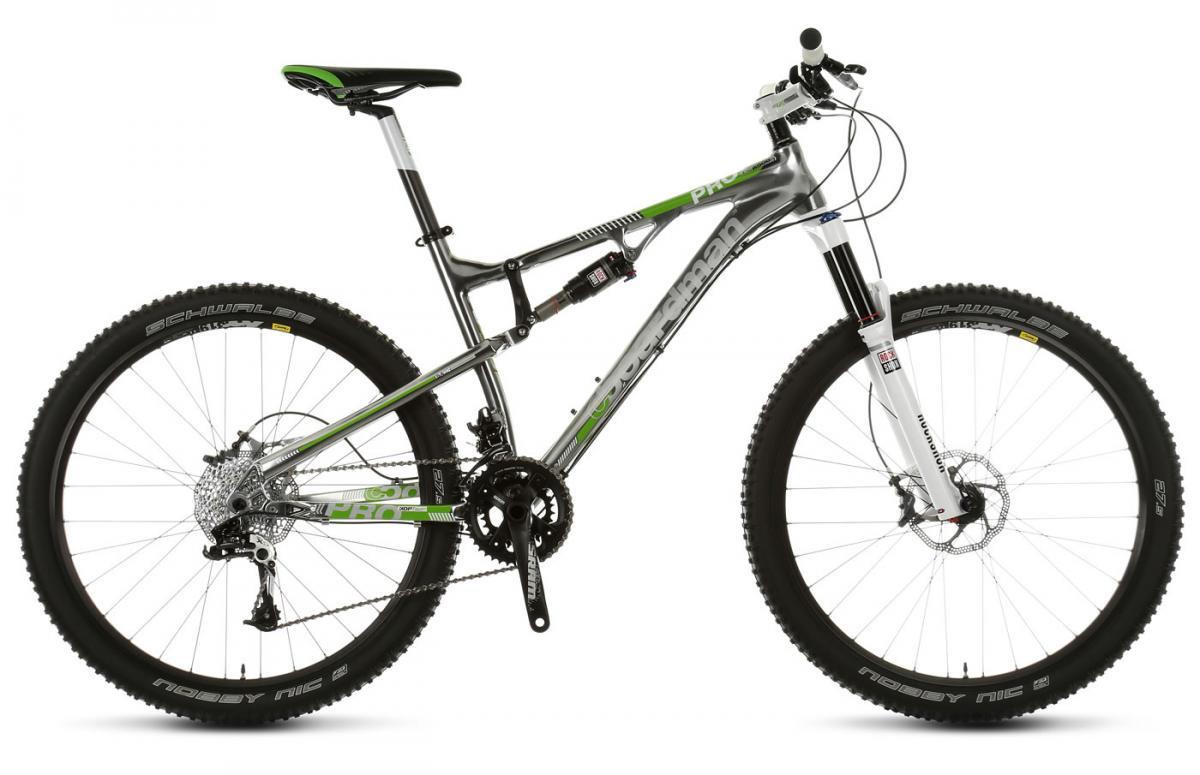 Boardman FSPRO 650b: A modern mountain bike featuring a sleek silver and green design, equipped with wide tires, a front suspension fork, and a prominent drivetrain. The bike is positioned on a white background, highlighting its sporty build and components.