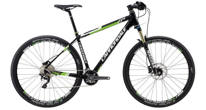 Cannondale F29 6: A black and green Cannondale mountain bike with a lightweight frame, front suspension, and knobby tires, positioned against a white background.