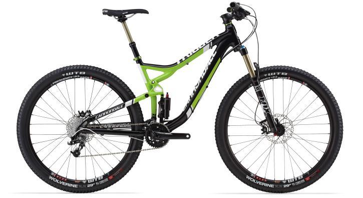Cannondale Trigger 29 3: A modern mountain bike featuring a black and lime green frame, equipped with dual suspension, wide tires, and a gear shift mechanism. The bike is positioned on a neutral background, showcasing its design and components.