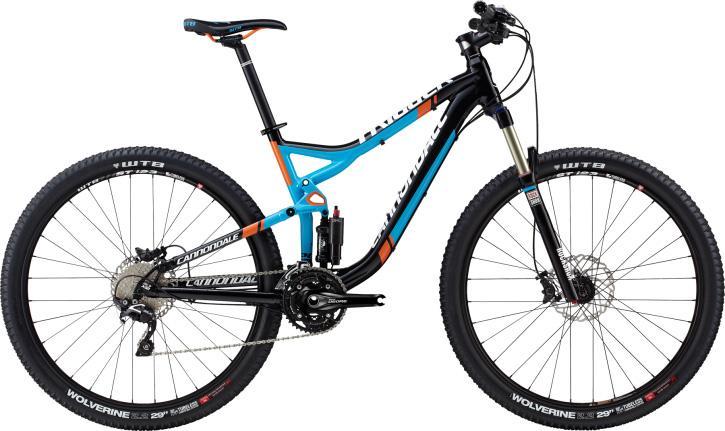 Cannondale Trigger: A modern mountain bike featuring a sleek black and blue design with orange accents. It has wide tires, a sturdy frame, and a front suspension system, ideal for off-road trails and rugged terrains. The bike is equipped with disc brakes and a variety of gears for varying levels of difficulty.