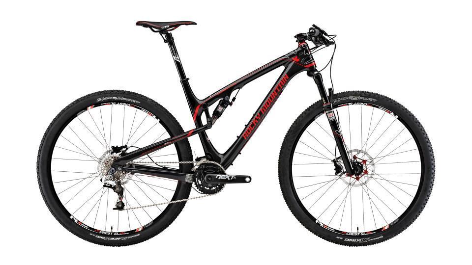 Rocky Mountain Element: A modern black and red mountain bike featuring a lightweight frame, disc brakes, and knobby tires, designed for off-road cycling. The bike has a sleek, aerodynamic design with prominent branding and is shown from the side.