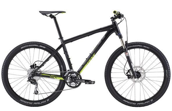 Felt 7 Sixty: A black and green mountain bike displayed from the side, featuring wide tires, a suspension fork, and disc brakes. The bike has a sleek frame design and prominent gear components, showcasing its suitability for off-road terrain.