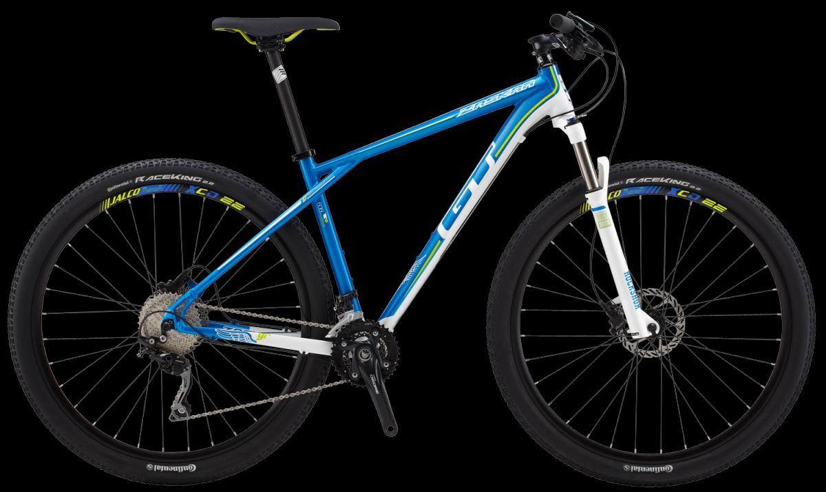 GT Zaskar 9R Sport: Alt text: A blue and white GT mountain bike with black wheels and disc brakes. The bike features a lightweight frame, prominent tires with "Racing King" branding, and a front suspension fork. The image is set against a black background.