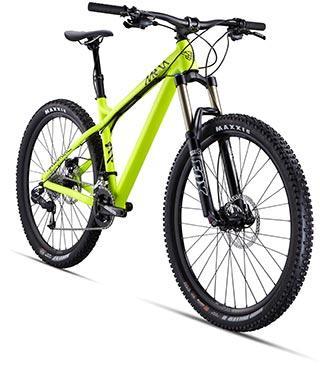 Commencal Meta HT 1: Mountain bike with a bright green frame, black front suspension forks, and Maxxis tires, positioned at a slight angle to showcase its design and features.