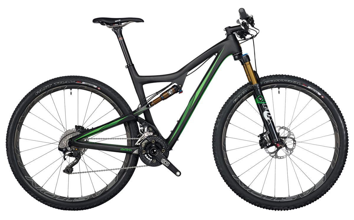 Ibis Ripley 29: A black and green mountain bike angled to the right, featuring rugged tires, a suspension fork, and a sleek frame design. The bike is equipped with off-road components, including disc brakes and a visible drivetrain, set against a neutral background.