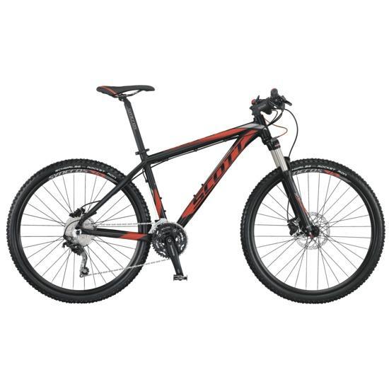 Scott Scale 770 Bike: A black and red mountain bike with a sleek frame, front suspension, and wide tires, designed for off-road cycling. The bike features disc brakes, a Shimano drivetrain, and a sporty seat.