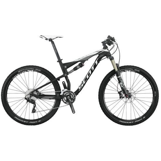 Scott Spark 740 Bike: A black and white mountain bike with front suspension, wide tires, and a sleek design, featuring the brand name "Scott" prominently on the frame.