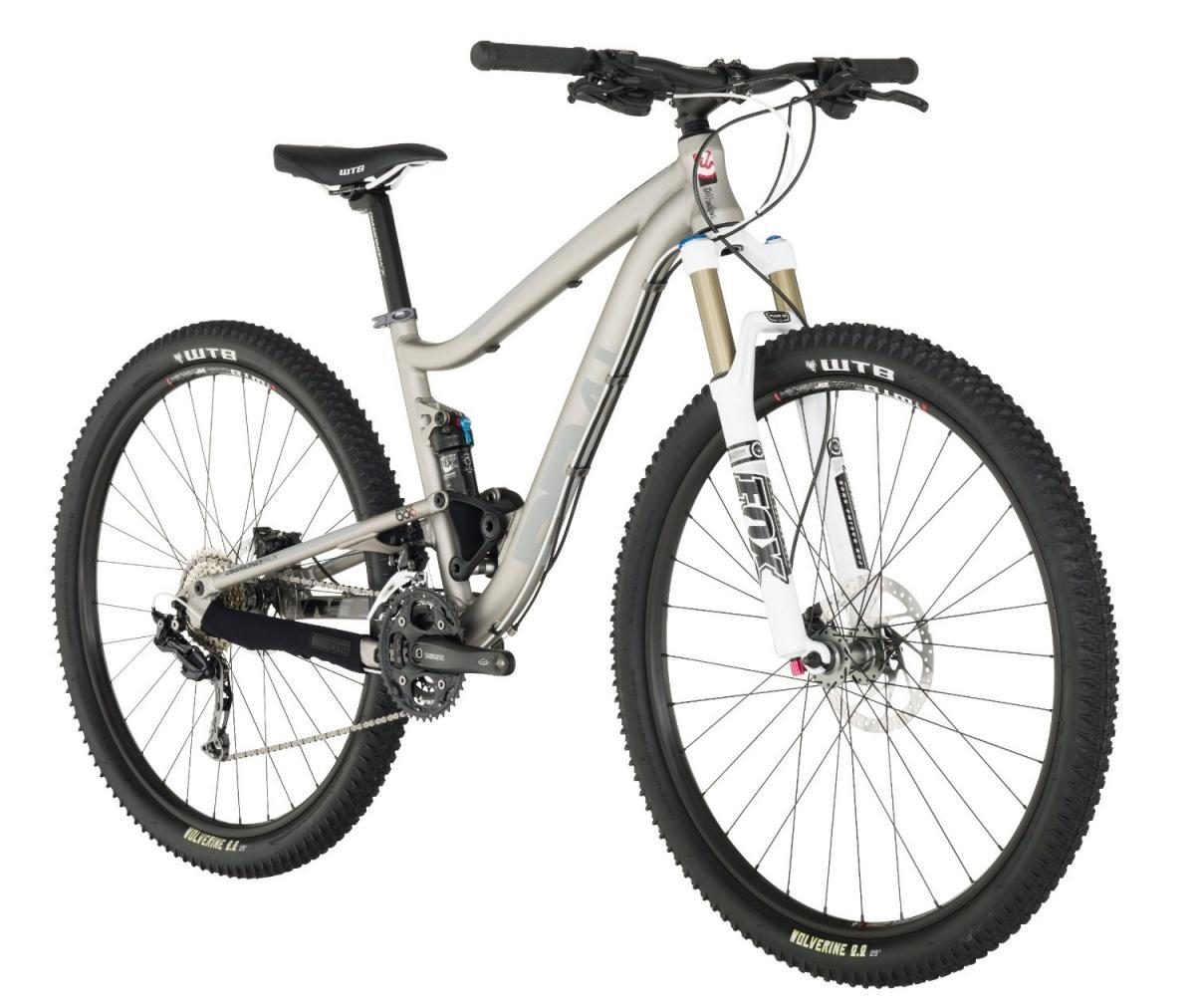 Diamondback Sortie 1 29er: Alt text: A modern mountain bike with a silver frame, front suspension, and rugged tires, positioned at an angle to showcase its features. The bike has a sleek design suitable for off-road cycling.