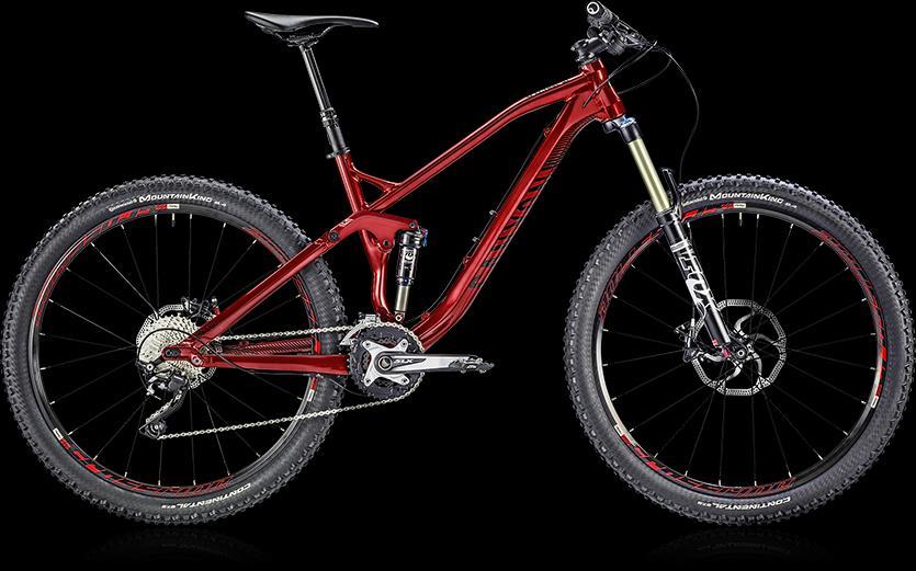 Canyon Spectral AL 6.0: A red mountain bicycle with a sleek aluminum frame, high-performance suspension, and rugged tires, positioned against a black background. The bike features disc brakes and a modern drivetrain, showcasing its design for off-road cycling.