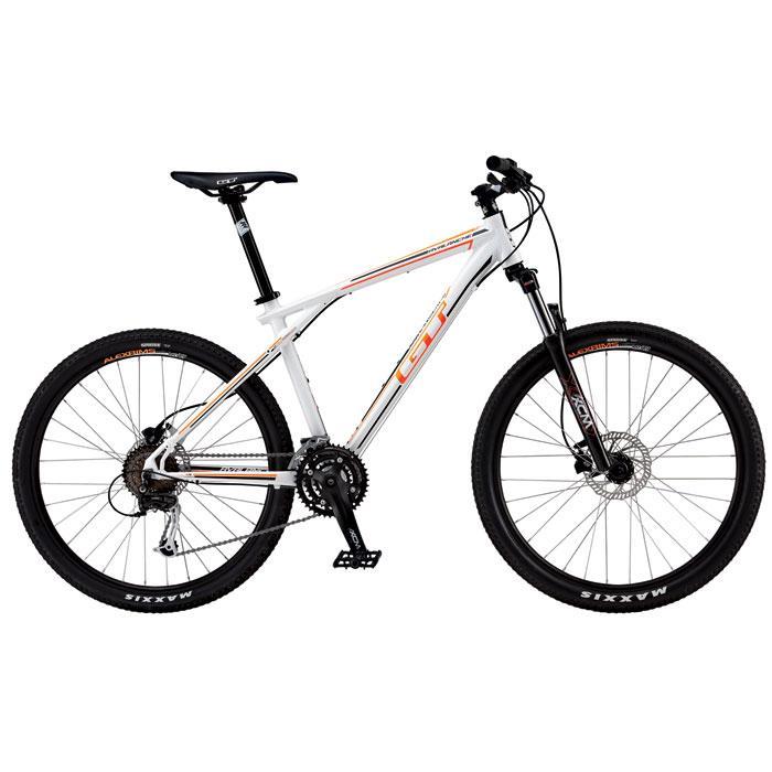 GT Avalanche: Mountain bike with a white frame and colorful accents, featuring thick tires, front suspension, and disc brakes. The bike is positioned against a plain background.