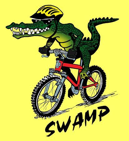 A cartoon crocodile wearing a yellow helmet is riding a red mountain bike. The crocodile has an athletic build and a big grin, showing its teeth. Below the image, the word "SWAMP" is displayed in bold, stylized letters. The background is a bright yellow color.