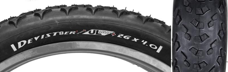 Origin-8 Devist-8er Ultralight: Alt text: Close-up of a mountain bike tire labeled "Davit8er" with specifications "26 x 4.0". The tire features a knobby tread pattern designed for traction on rough terrain.