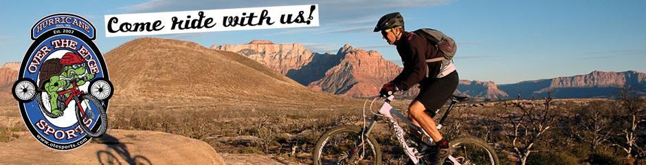 A cyclist navigates a scenic mountainous terrain during sunset, showcasing a rugged landscape with distant cliffs. The image features the logo of "Over the Edge Sports," along with the text "Come ride with us!" at the top.