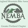 Logo of the New England Mountain Bike Association (NEMBA) - Greater Portland Chapter. The design features mountain imagery within a circular motif, with "NEMBA" prominently displayed.