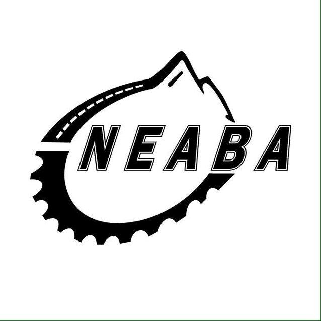 Logo of NEABA featuring a stylized mountain and a bicycle chainring, with the text "NEABA" prominently displayed in bold letters. The design is in black and white, representing a cycling organization or group.