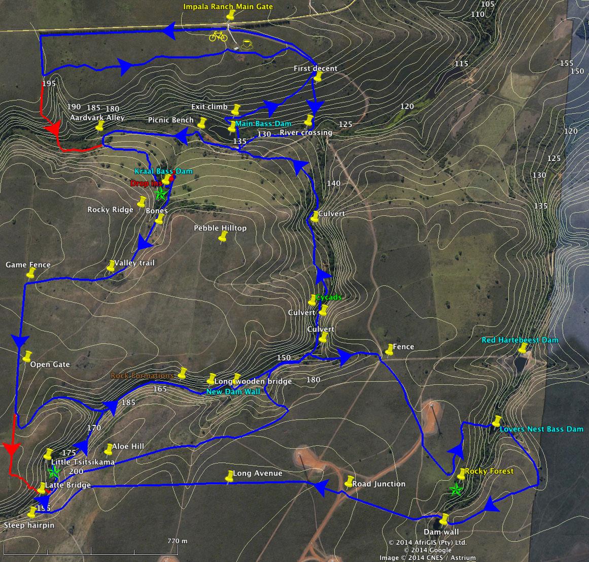 Map of a biking trail at Impala Ranch, featuring topographic lines, route markers, and notable landmarks including dams, bridges, and trail sections. Various features are labeled, indicating points of interest and elevation changes along the route. Impala Ranch MTB Trails mountain bike trail.