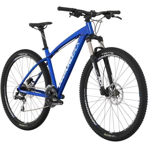 Diamondback Overdrive Sport: A blue mountain bike with a lightweight aluminum frame, front suspension, and knobby tires, designed for off-road trails. The bike features dual disc brakes and a sleek, sporty design.
