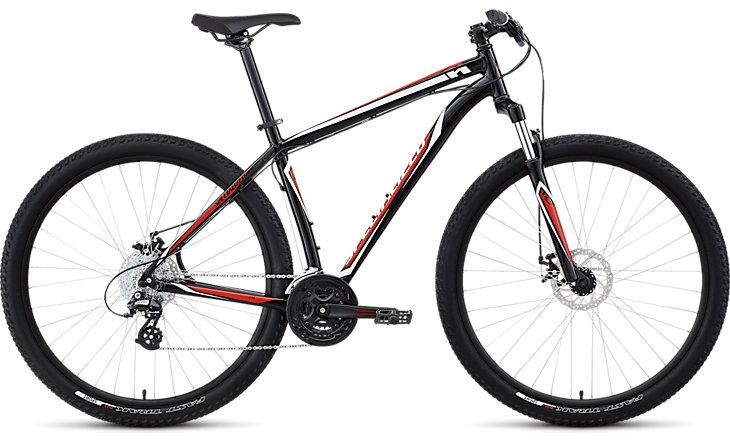 Specialized Hardrock Disc 29: A black and red mountain bike with thick tires, a lightweight frame, and front suspension. The bike features disc brakes, multiple gears, and a sleek design suitable for off-road riding.