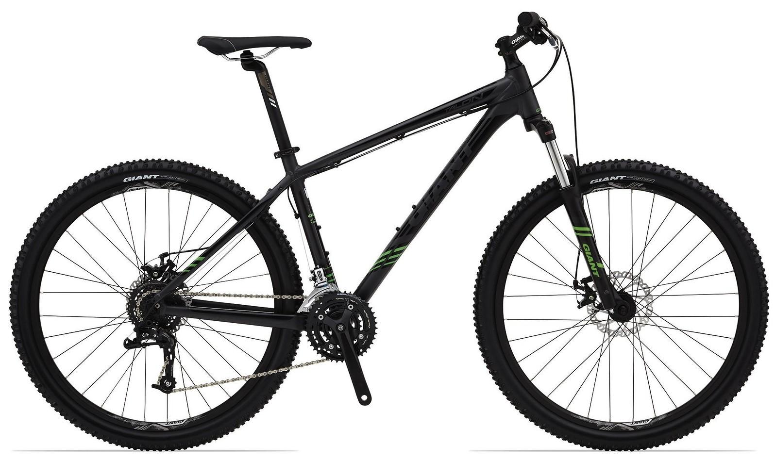 Giant Talon 27.5: Ablack mountain bike featuring a sturdy frame, thick tires, and a geared drivetrain, designed for off-road cycling.