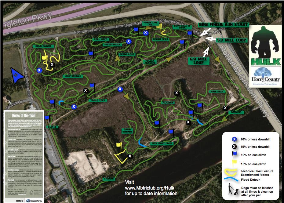 Map of the Hulk Trail in Horry County, showing various bike and running loops, including a 5.3-mile loop and a 6.8-mile loop. The map includes trail features, rules, and information on elevations and technical trails, indicated by color-coded lines and symbols. The map also displays nearby roads and landmarks. Horry County Bike Run Park mountain bike trail.