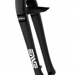 Image of a black mountain bike fork featuring a sleek design, with the brand logo visible on the side. The fork includes an integrated mudguard at the top, showcasing a modern and functional look suitable for off-road cycling.