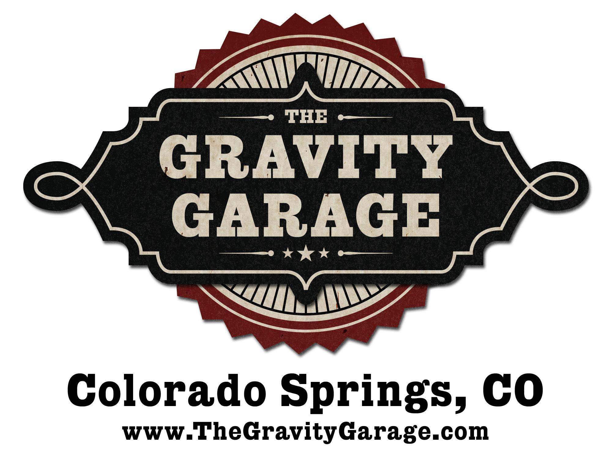 Logo for The Gravity Garage, located in Colorado Springs, CO. The design features a black and red color scheme with ornate text and details. The logo includes the website URL, www.TheGravityGarage.com.