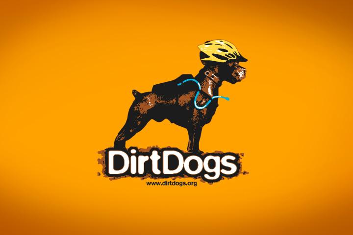 A playful graphic of a dog wearing a yellow helmet, illustrated in a stylized manner against a bright orange background. The dog is shown in profile, with a blue leash attached. Below the dog, the text "DirtDogs" is prominently displayed, along with the website URL www.dirtdogs.org.