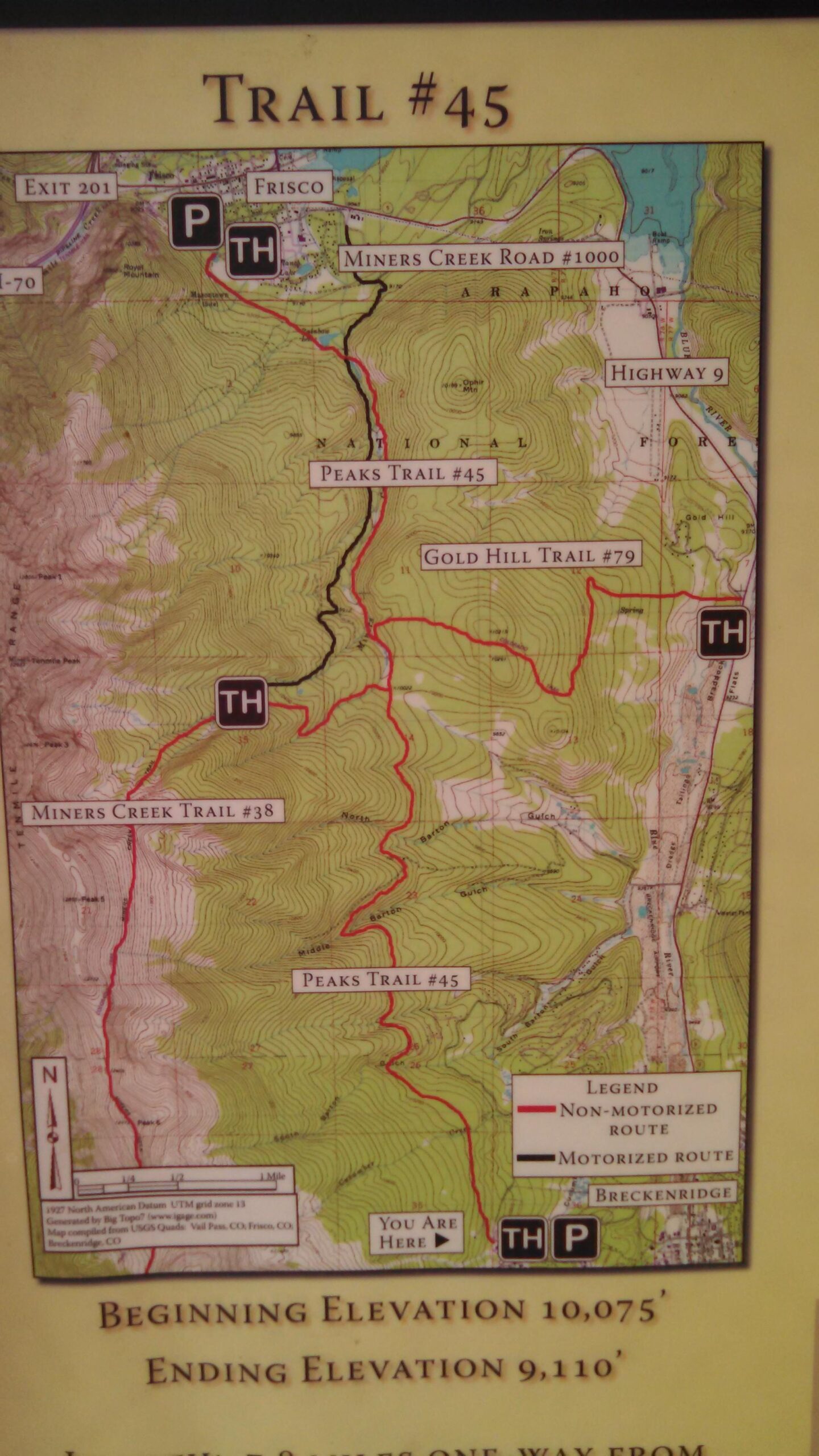 Map of Trail #45, showing the route from Frisco, Colorado. Includes details on nearby trails, starting and ending elevations, and a legend indicating motorized and non-motorized paths. The map features topographical lines and highlights marked trailheads. Peaks Trail mountain bike trail.