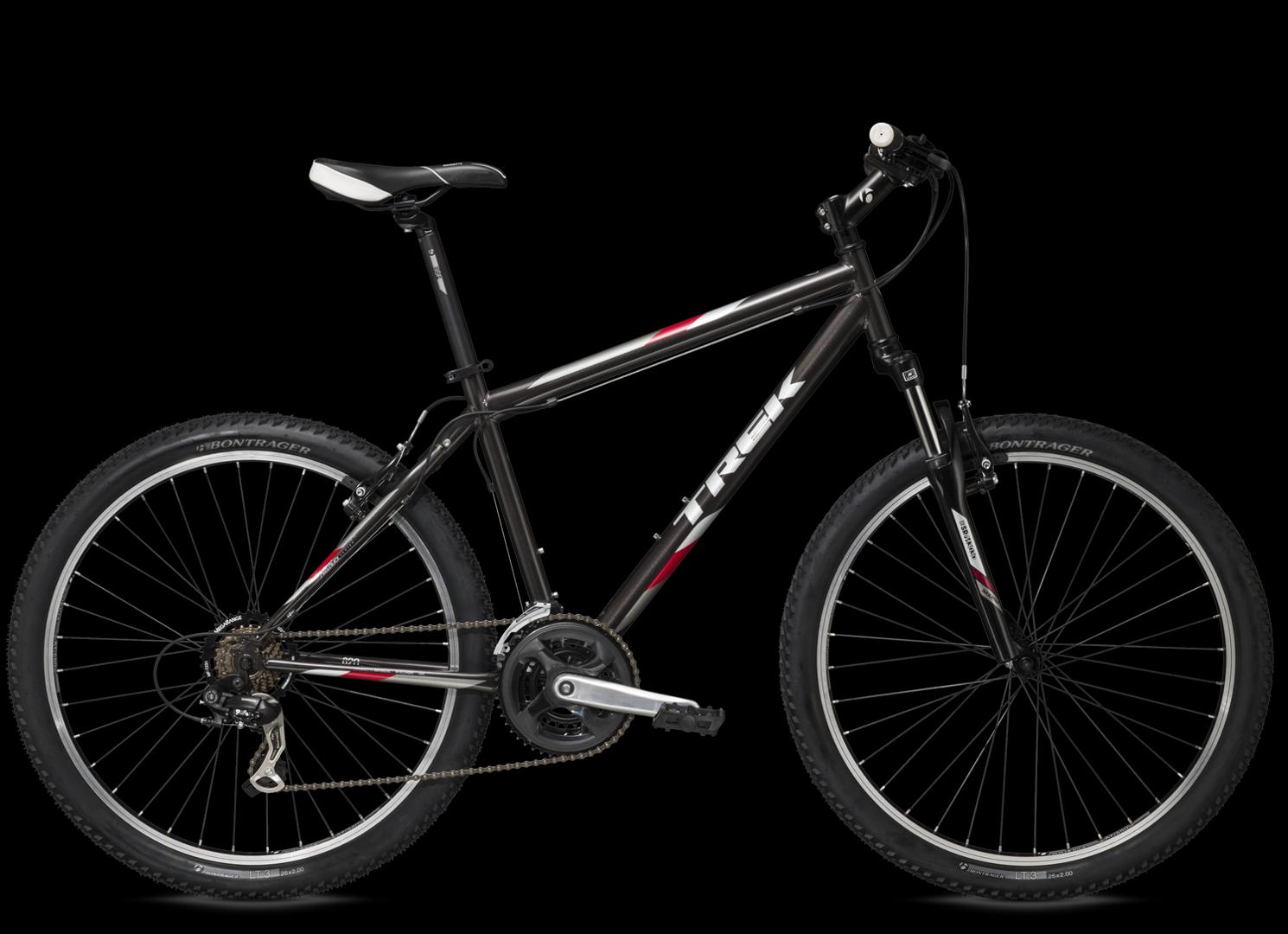 Trek 820: A black Trek mountain bike with a sleek design, featuring wide tires, a dual suspension system, and a silver crankset. The bike is showcased against a black background, highlighting its modern frame and sporty details.
